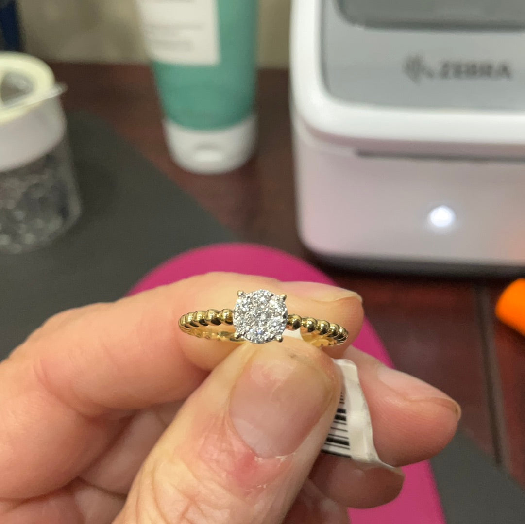 14ky headed ring .20 diamond