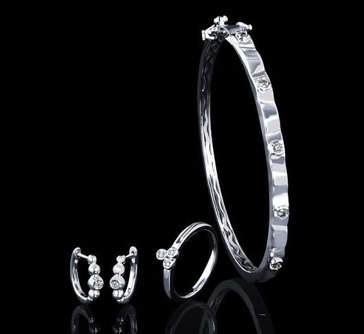 .01 Ctw. Diamond Hoop Earrings In Sterling Silver